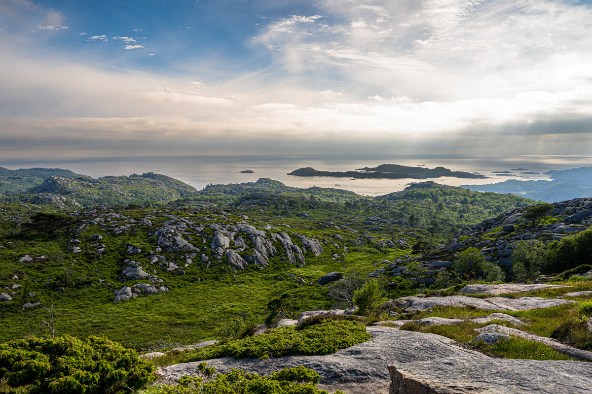 photo-wallpaper-rocky-coastal-landscape-with-distant-islands-and-dramatic-sky