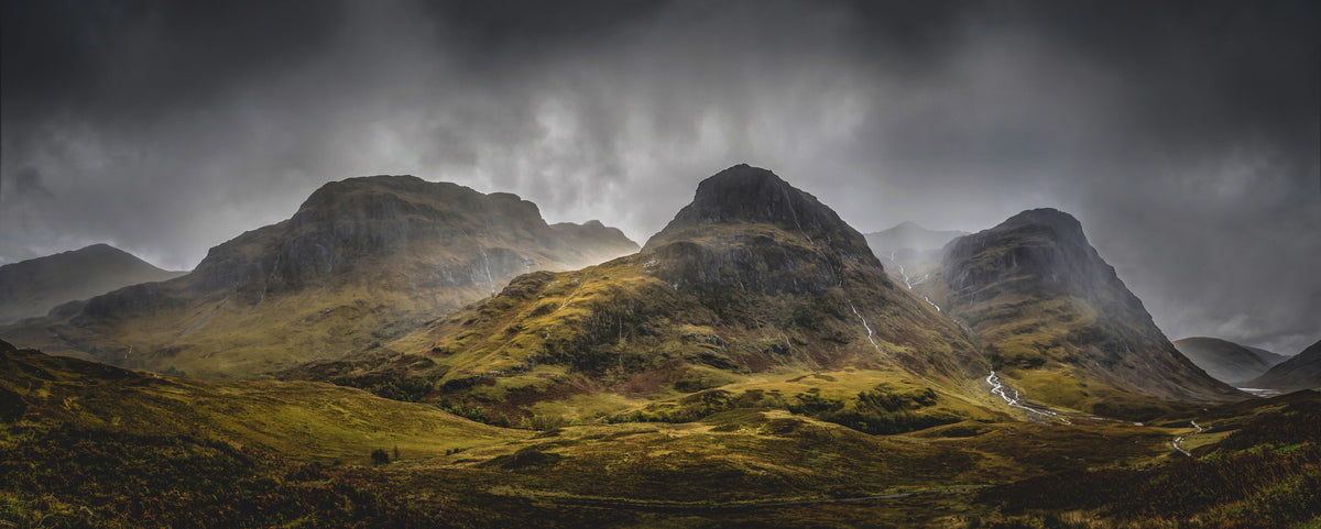 photo-wallpaper-three-sisters-of-glencoe-beneath-brooding-rain-clouds