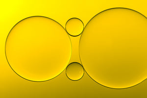 photo-wallpaper-vibrant-yellow-liquid-spheres