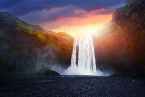 photo-wallpaper-skogafoss-glowing-at-sunset-icelands-thundering-waterfall