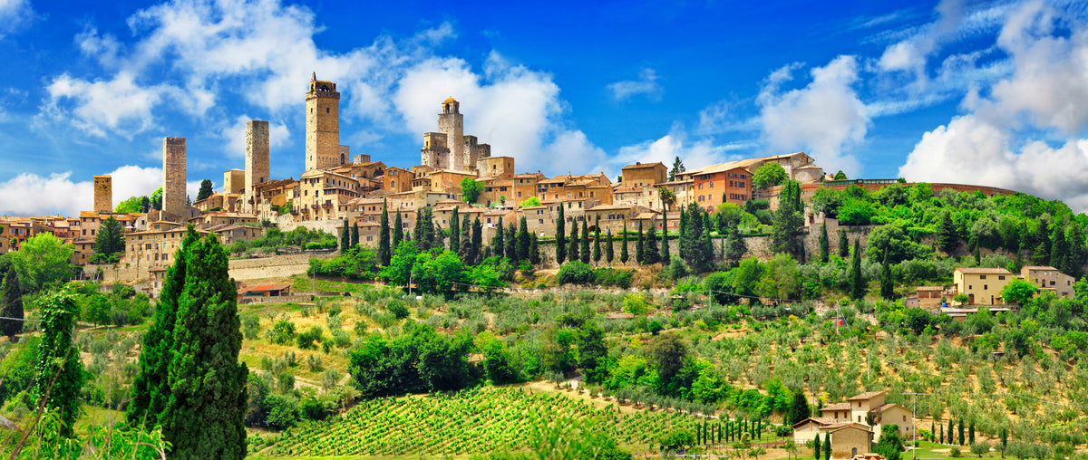 photo-wallpaper-san-gimignano-above-cypresses-and-vineyards-in-summer-light