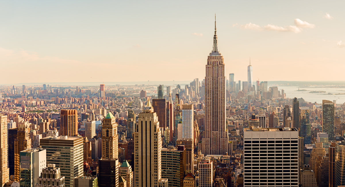 photo-wallpaper-empire-state-building-above-the-manhattan-skyline-in-warm-evening-light