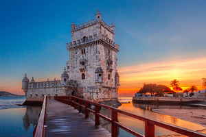 photo-wallpaper-belem-tower-at-fiery-sunset-with-red-walkway-over-the-tagus