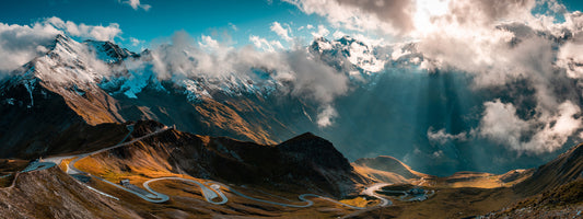 photo-wallpaper-hairpin-bends-of-the-grossglockner-high-alpine-road-under-breaking-clouds