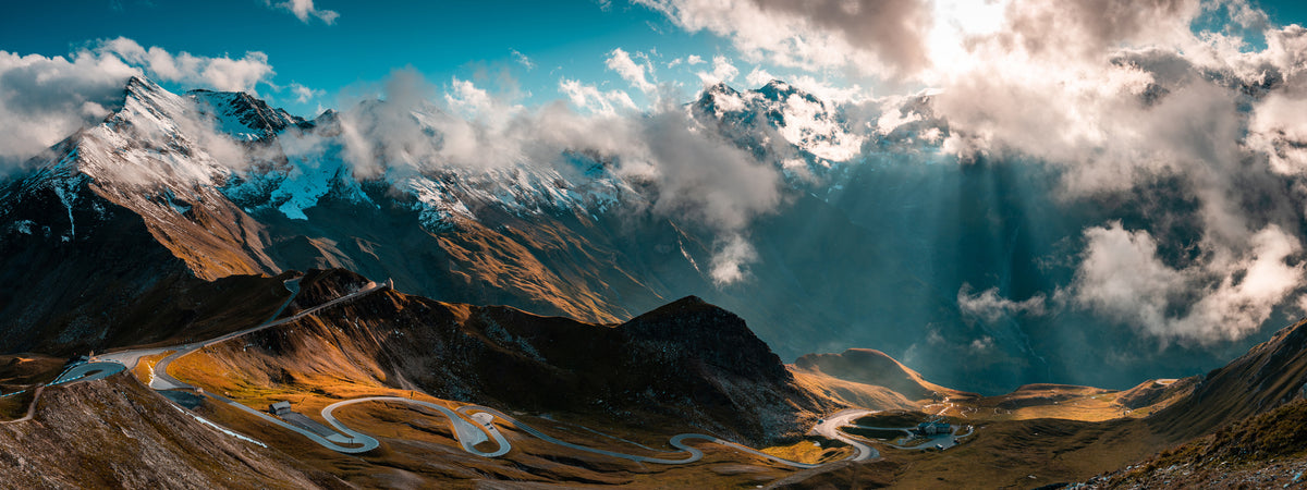 photo-wallpaper-hairpin-bends-of-the-grossglockner-high-alpine-road-under-breaking-clouds