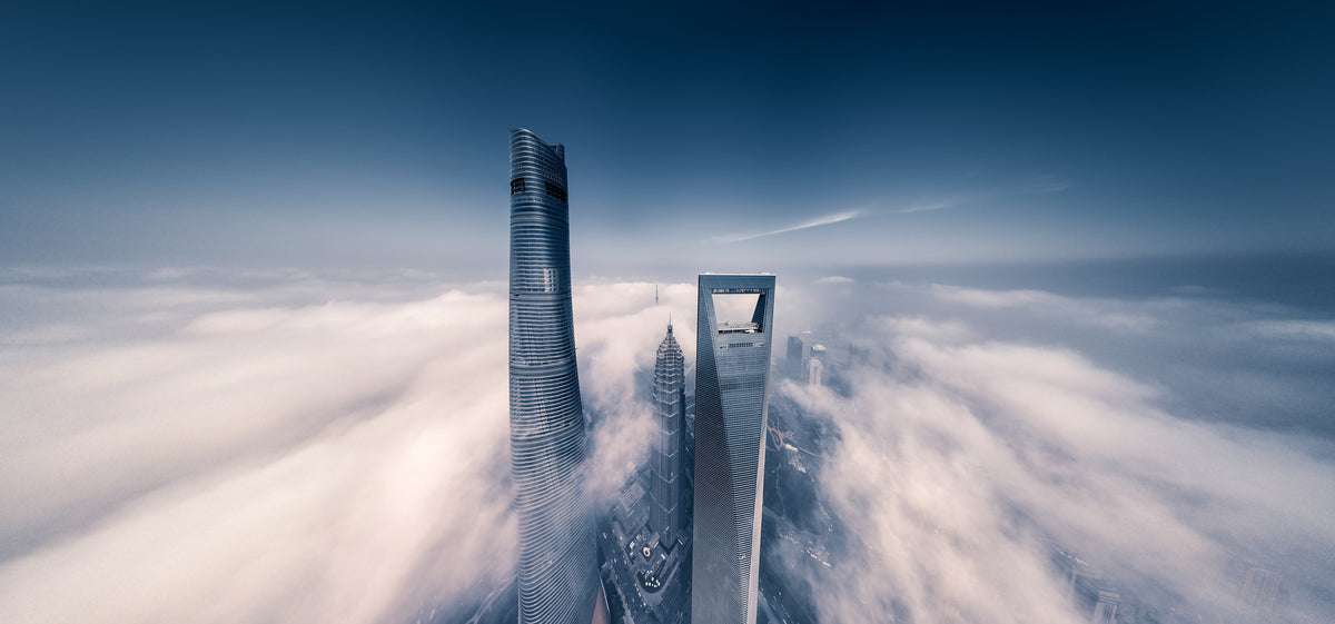 photo-wallpaper-majestic-skyscrapers-above-clouds