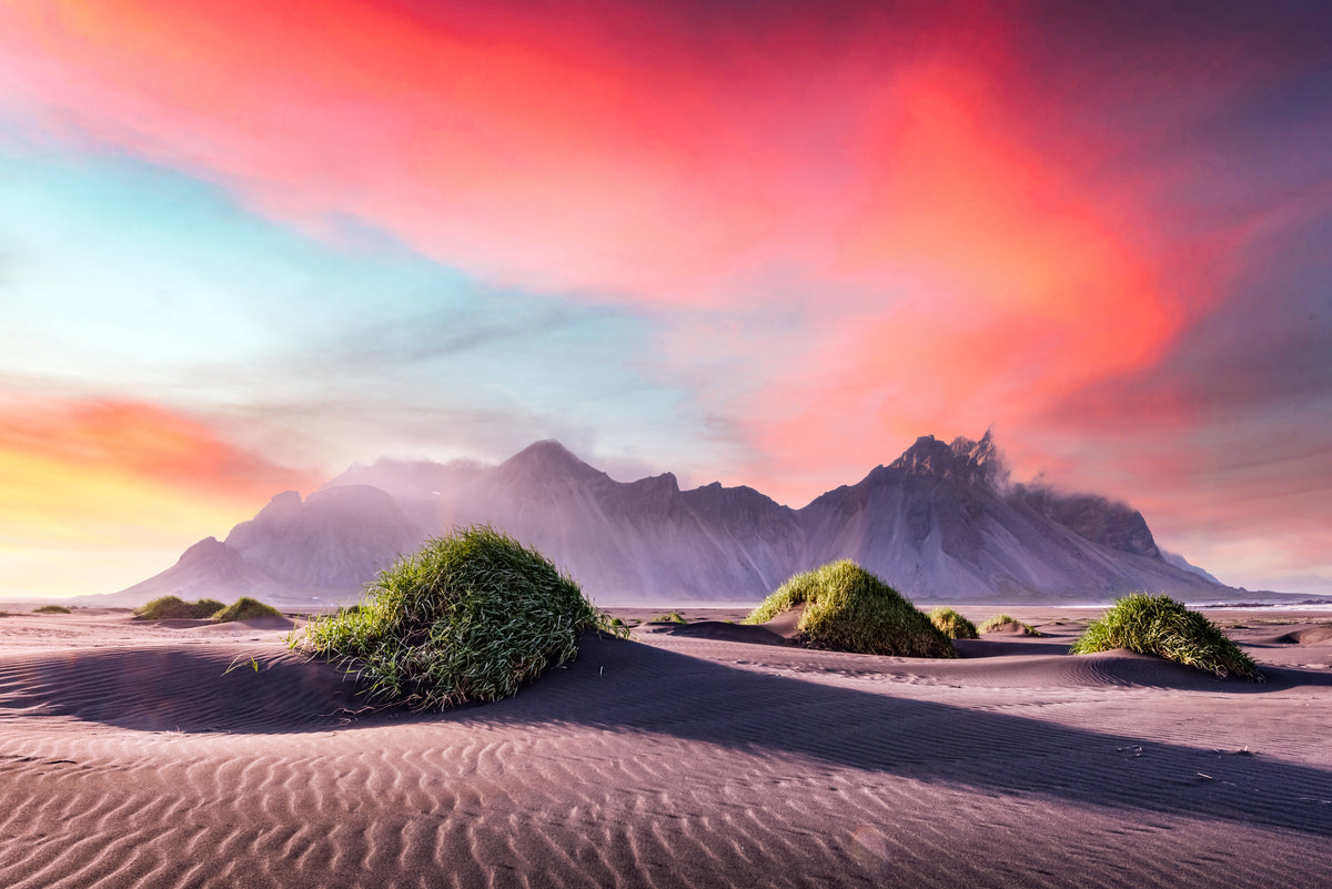 photo-wallpaper-black-sand-dunes-below-vestrahorn-under-a-glowing-sunset-sky