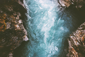 photo-wallpaper-turquoise-rapids-rushing-through-a-dark-rock-canyon-from-above