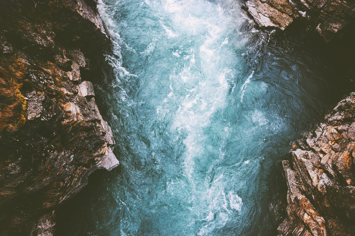 photo-wallpaper-turquoise-rapids-rushing-through-a-dark-rock-canyon-from-above
