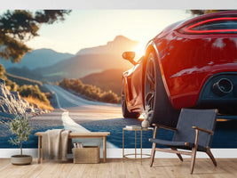 photo-wallpaper-red-sports-car-on-a-mountain-road-in-golden-evening-backlight