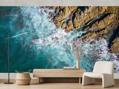 photo-wallpaper-rocky-shore-meeting-turquoise-water-in-a-foaming-aerial-view