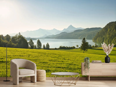 photo-wallpaper-a-large-green-field-with-a-lake-and-mountains-in-the-background