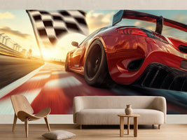 photo-wallpaper-red-race-car-sweeping-past-the-chequered-flag-in-low-evening-sun