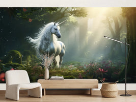 photo-wallpaper-white-unicorn-in-a-mossy-forest-with-sunbeams-and-pink-blossoms
