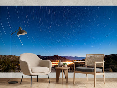 photo-wallpaper-star-trails-over-a-desert-track-under-deep-blue-night-sky
