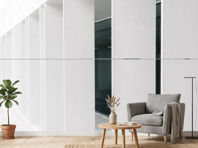 photo-wallpaper-white-concrete-fins-along-a-minimalist-facade-in-receding-perspective