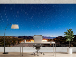 photo-wallpaper-star-trails-over-a-desert-track-under-deep-blue-night-sky