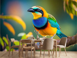 photo-wallpaper-tropical-bird-in-blue-and-orange-on-a-mossy-branch