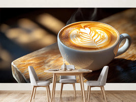 photo-wallpaper-a-steaming-cup-of-coffee-with-latte-art-on-a-wooden-table-in-a-cafe