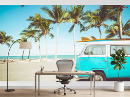 photo-wallpaper-turquoise-camper-van-with-surfboard-on-a-palm-lined-beach-in-retro-summer-light
