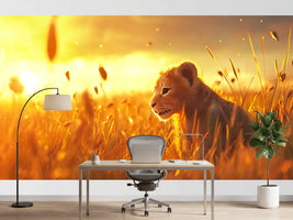 photo-wallpaper-a-baby-lion-is-sitting-in-the-grass-in-front-of-a-sunset