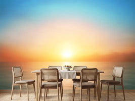 photo-wallpaper-sunrise-over-a-calm-sea-with-soft-glowing-light