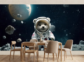 photo-wallpaper-teddy-bear-in-a-spacesuit-on-a-grey-lunar-surface-beneath-a-distant-planet