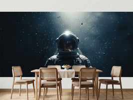 photo-wallpaper-an-astronaut-is-shown-in-his-spacesuit-with-space-on-the-background