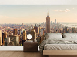 photo-wallpaper-empire-state-building-above-the-manhattan-skyline-in-warm-evening-light