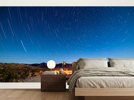 photo-wallpaper-star-trails-over-a-desert-track-under-deep-blue-night-sky