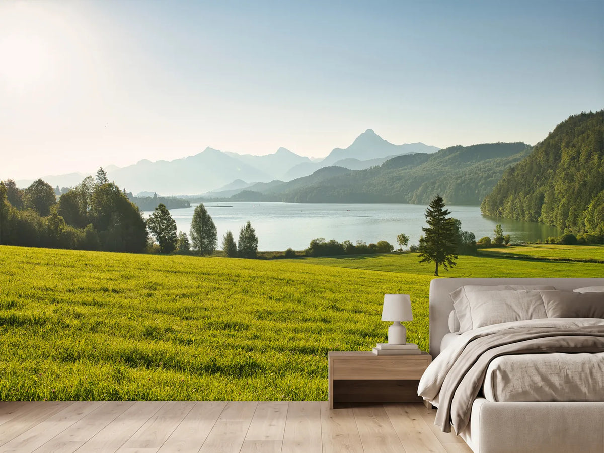 photo-wallpaper-a-large-green-field-with-a-lake-and-mountains-in-the-background
