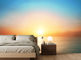 photo-wallpaper-sunrise-over-a-calm-sea-with-soft-glowing-light