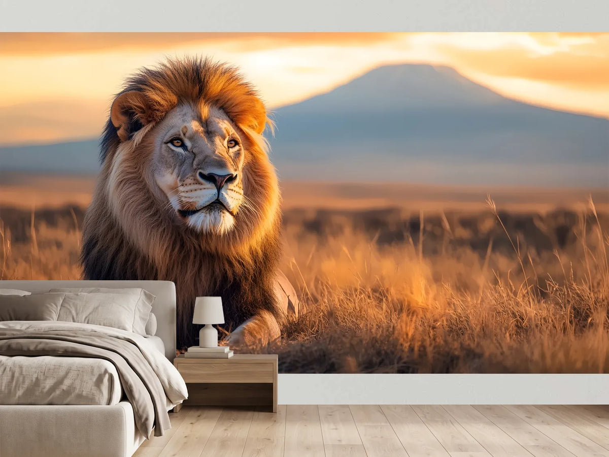 photo-wallpaper-lion-in-the-savannah-at-golden-hour-with-a-mountain-on-the-horizon