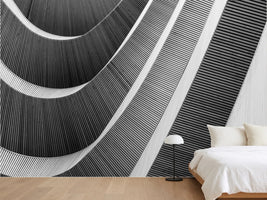 photo-wallpaper-curved-wooden-slats-sweeping-across-a-facade-in-black-and-white