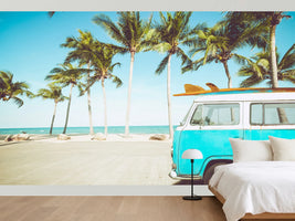 photo-wallpaper-turquoise-camper-van-with-surfboard-on-a-palm-lined-beach-in-retro-summer-light